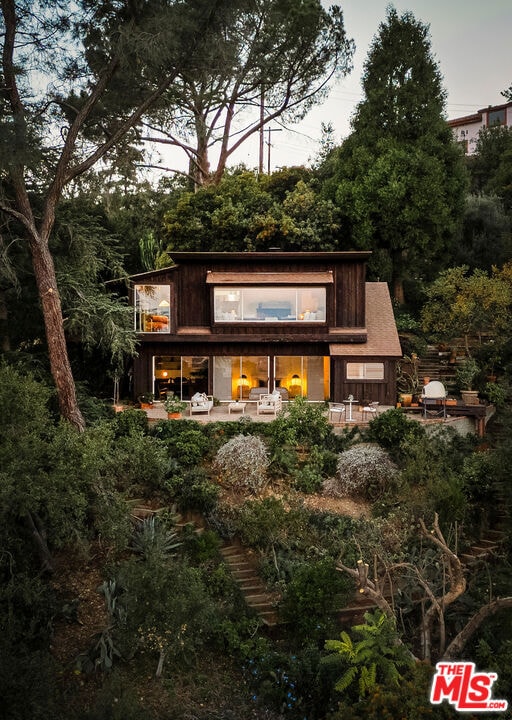 back of house with a patio area