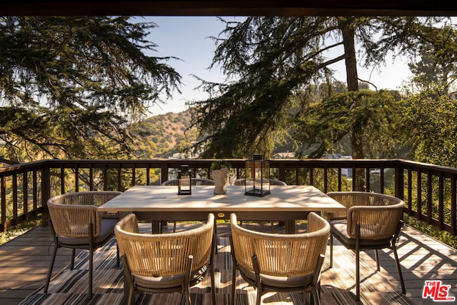 wooden terrace with a mountain view