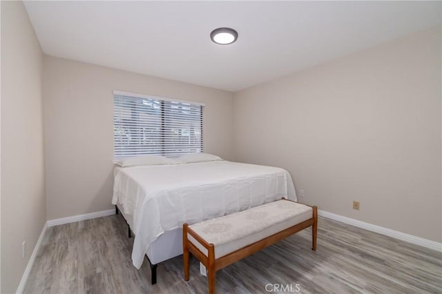 bedroom featuring hardwood / wood-style floors