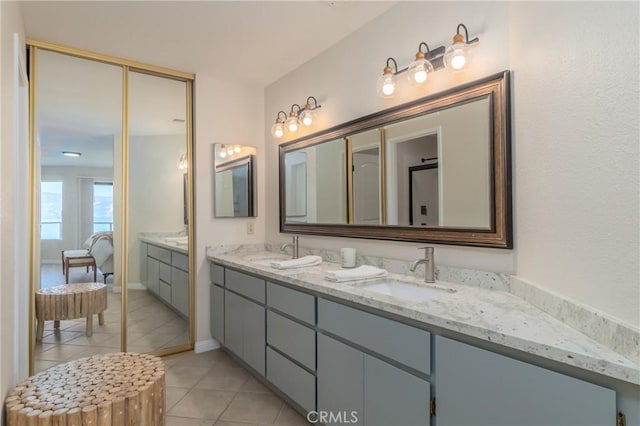 10 Royale Ave Unit 23B, Lakeport, CA 95453 - ensuite bathroom featuring double vanity and tile patterned floors