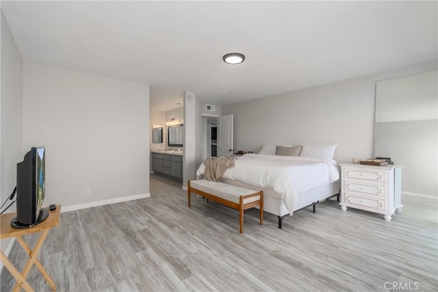 10 Royale Ave Unit 23B, Lakeport, CA 95453 - bedroom with light wood finished floors and ensuite bathroom