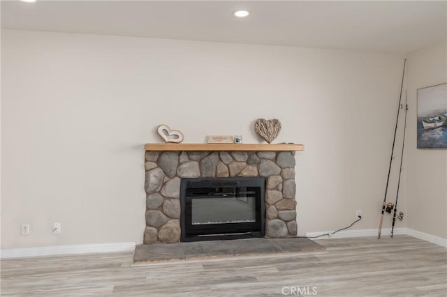 10 Royale Ave Unit 23B, Lakeport, CA 95453 - detailed view of wood finished floors, a fireplace, and recessed lighting