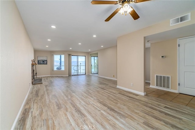 10 Royale Ave Unit 23B, Lakeport, CA 95453 - unfurnished living room with light wood-style floors, ceiling fan, and recessed lighting