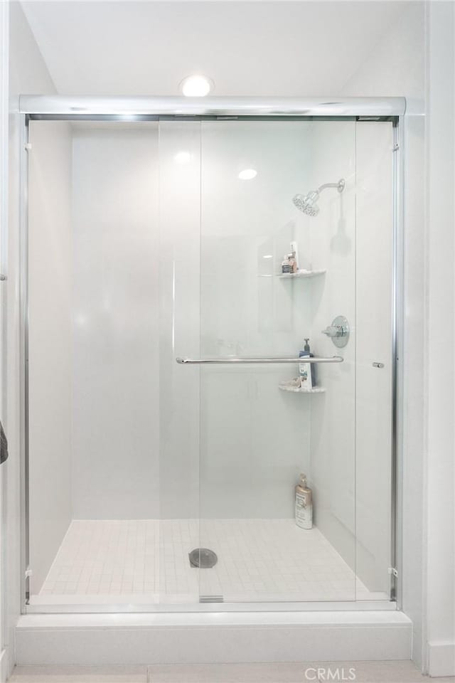 bathroom featuring walk in shower