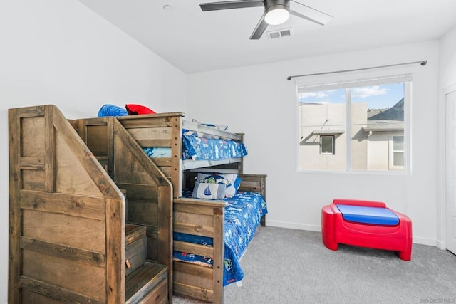 bedroom featuring ceiling fan and carpet flooring