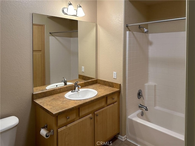 full bathroom with vanity, shower / bathing tub combination, and toilet