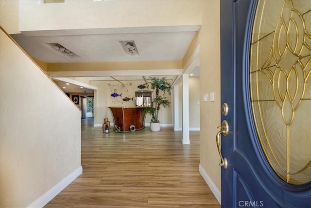 foyer featuring hardwood / wood-style floors