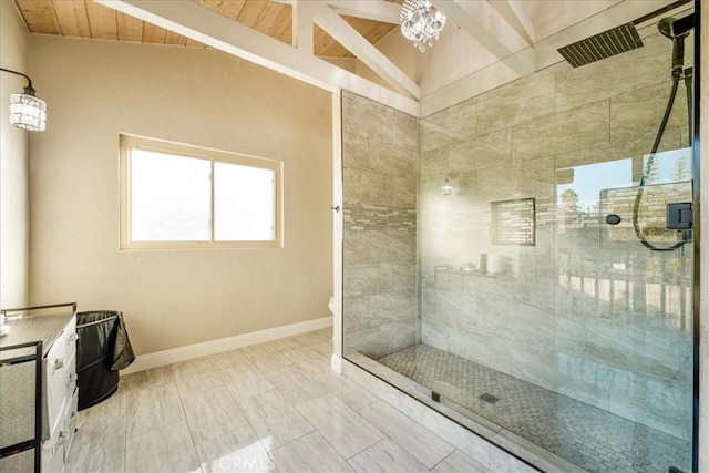 bathroom featuring vanity, vaulted ceiling with beams, toilet, a shower with shower door, and wood ceiling