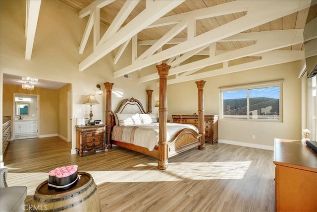 bedroom with hardwood / wood-style flooring, wooden ceiling, beamed ceiling, and high vaulted ceiling