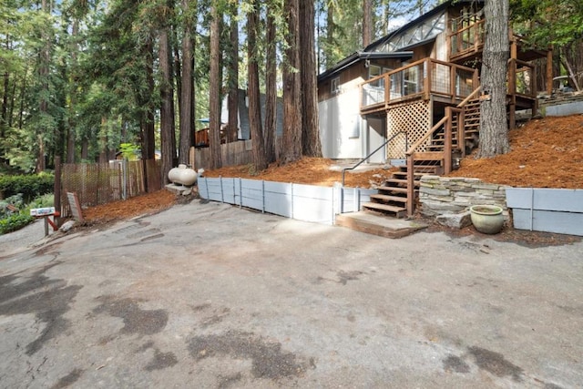 exterior space with a patio and a deck