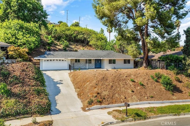 single story home with a garage