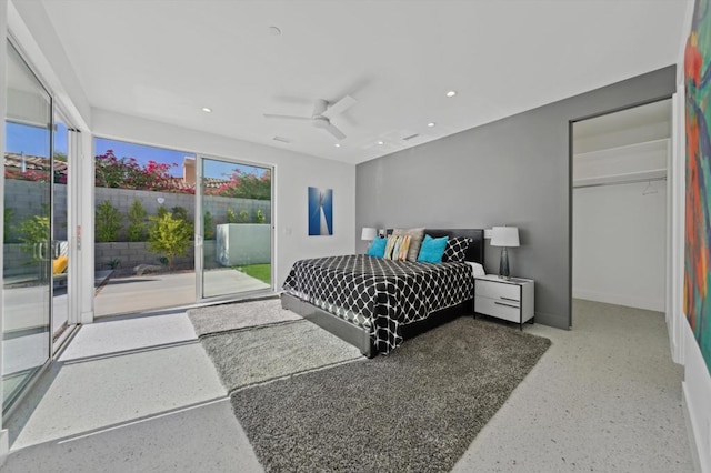 bedroom featuring access to outside, ceiling fan, and a closet