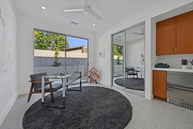 dining space featuring ceiling fan