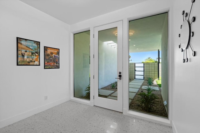 entryway featuring french doors