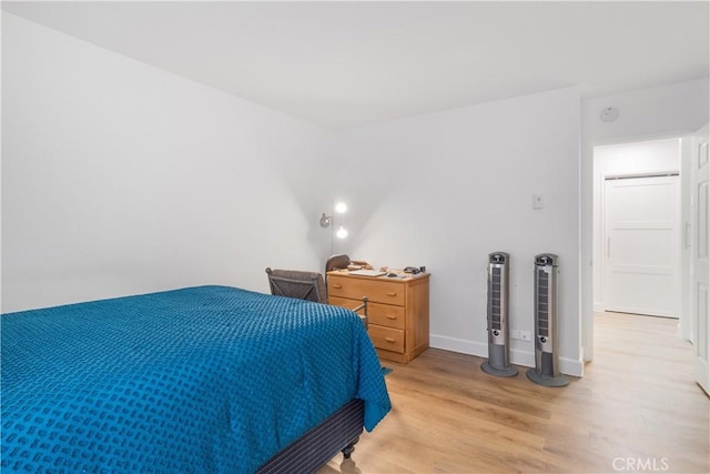 bedroom featuring light hardwood / wood-style floors