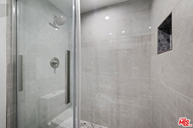 bathroom with an enclosed shower