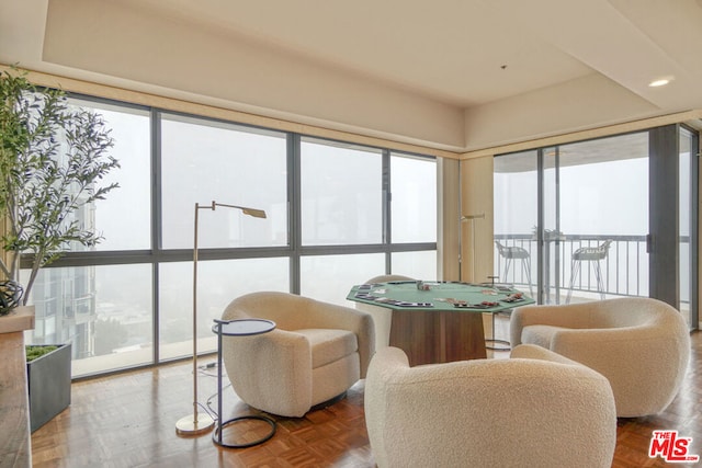 sunroom featuring a healthy amount of sunlight