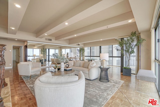 living room featuring beam ceiling and light parquet flooring