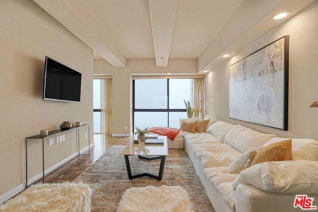 living room with hardwood / wood-style floors and beamed ceiling