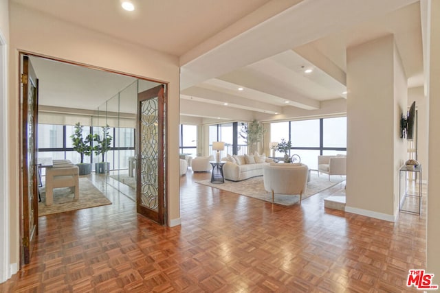 unfurnished living room featuring dark parquet floors