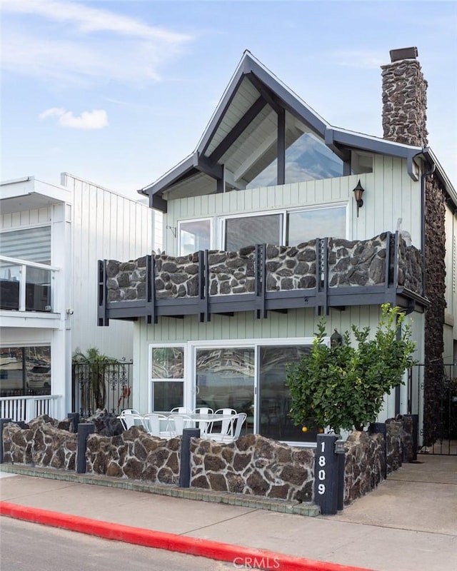 1809 W Bay Ave, Newport Beach, CA 92663 - rear view of property with a balcony