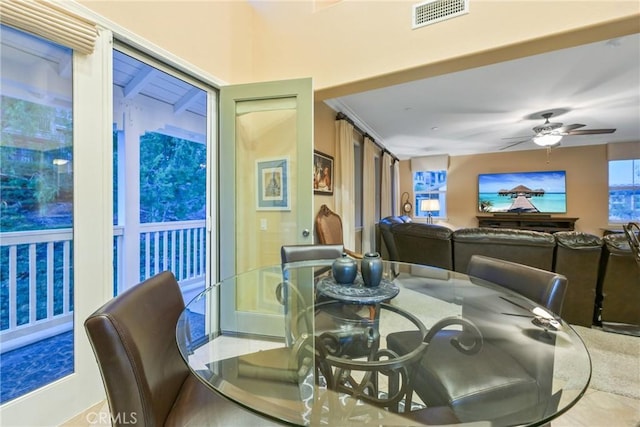 dining area with ceiling fan