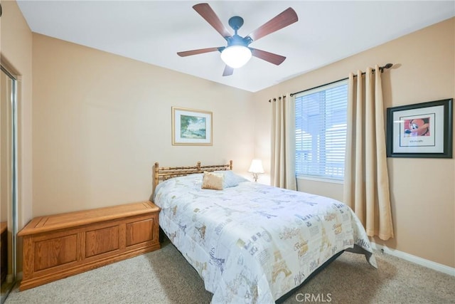 bedroom with ceiling fan and light colored carpet