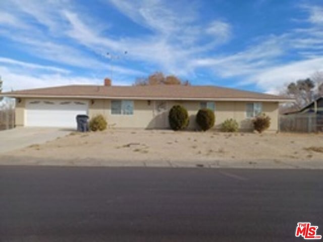 ranch-style house with a garage