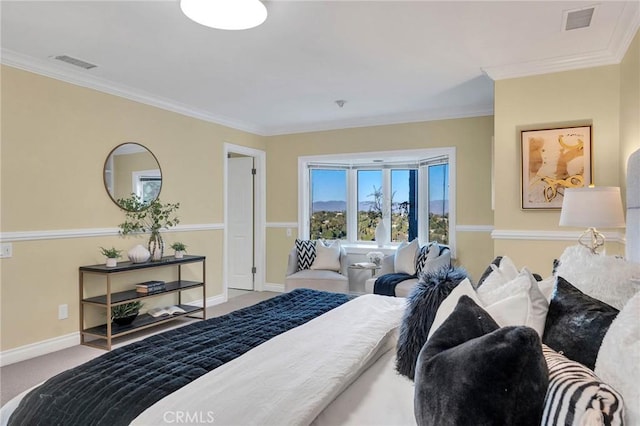 bedroom with crown molding and light carpet