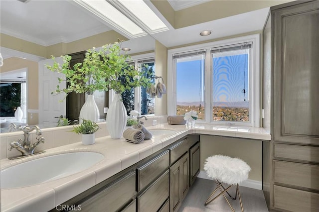 bathroom featuring vanity and crown molding