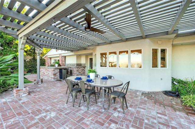 view of patio featuring area for grilling and a pergola