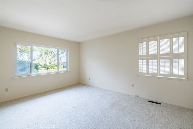 unfurnished room with carpet