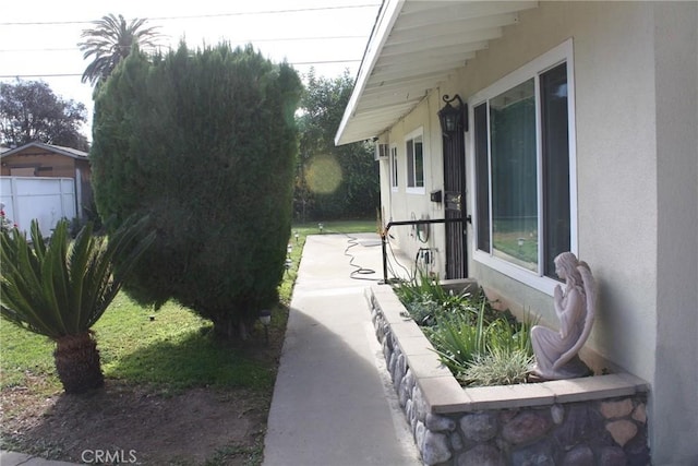 view of property exterior with stucco siding