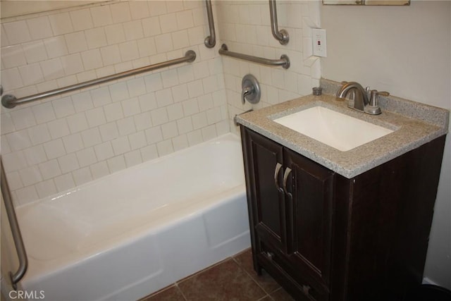 bathroom with tile patterned flooring and vanity