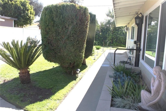 view of yard with fence