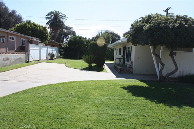 view of yard with a patio area and fence