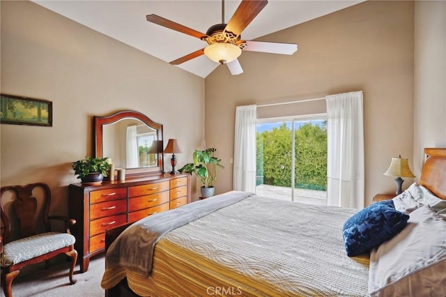 bedroom with carpet, access to outside, vaulted ceiling, and ceiling fan