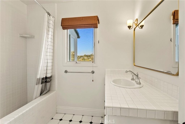 bathroom featuring shower / tub combo with curtain and vanity