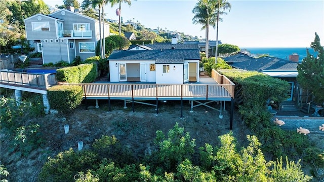 back of property featuring a deck