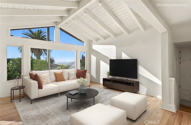 living room with beamed ceiling, high vaulted ceiling, and light hardwood / wood-style floors