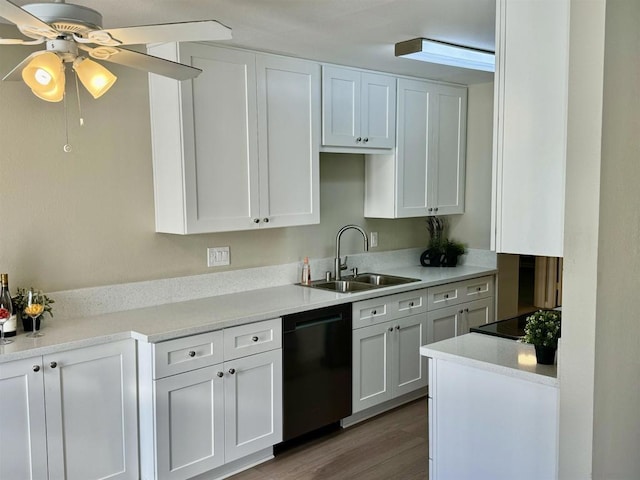 kitchen with ceiling fan, sink, black appliances, light hardwood / wood-style floors, and white cabinetry