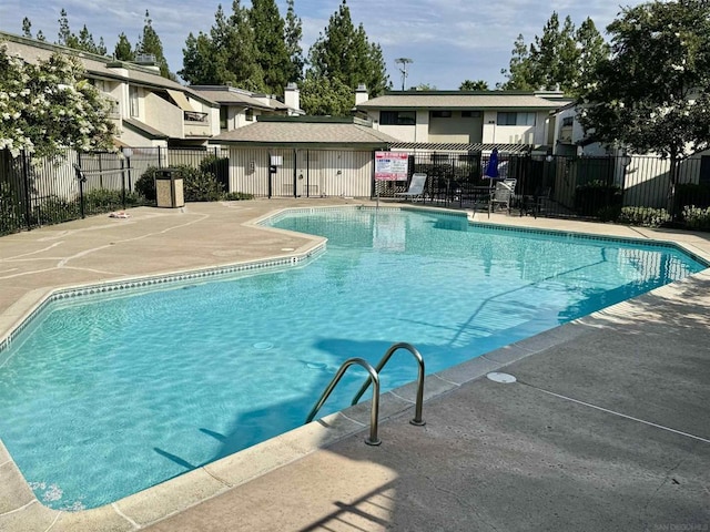 view of pool featuring a patio area