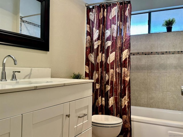 full bathroom featuring vanity, toilet, and shower / bathtub combination with curtain