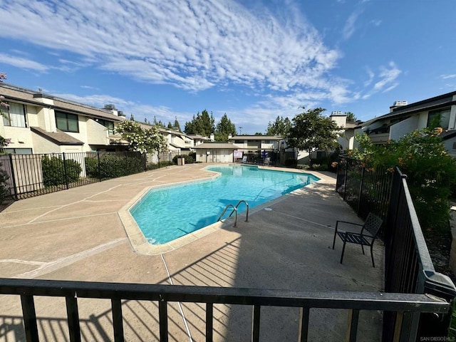 view of pool featuring a patio area