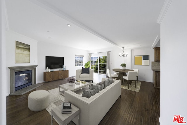 living room featuring dark wood-type flooring and a notable chandelier