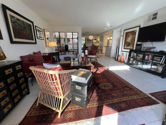 tiled living room with a textured ceiling