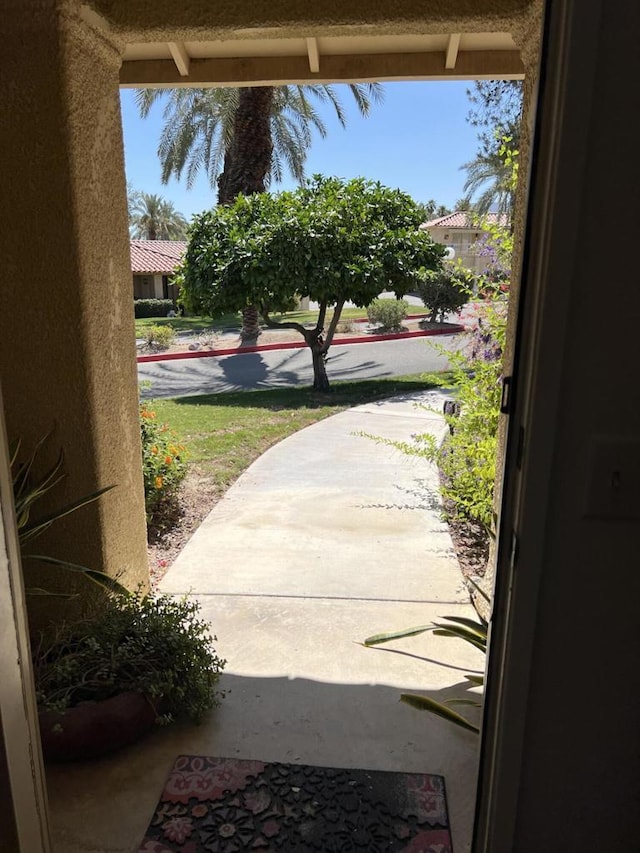 doorway to outside featuring concrete floors