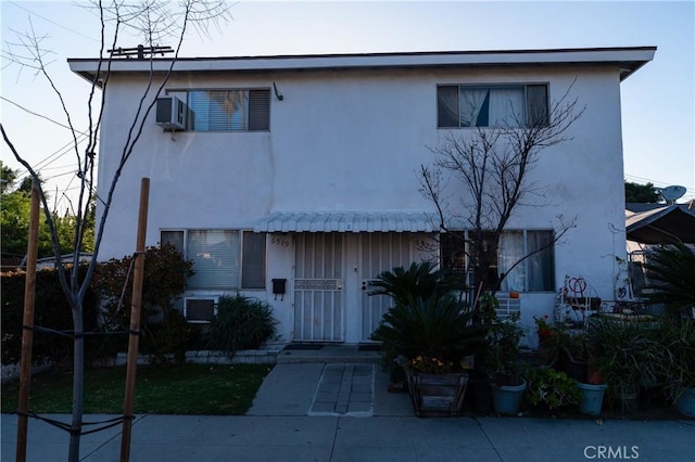 view of front of home featuring stucco siding