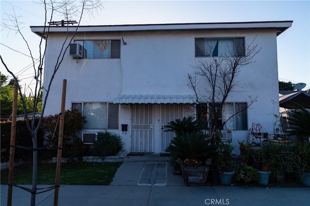 view of property with stucco siding