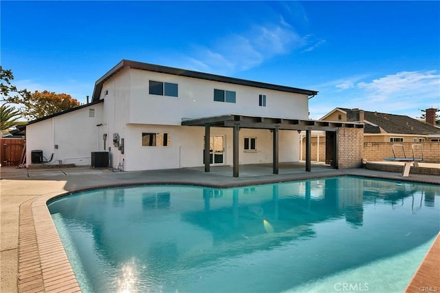 view of swimming pool with a patio and central AC